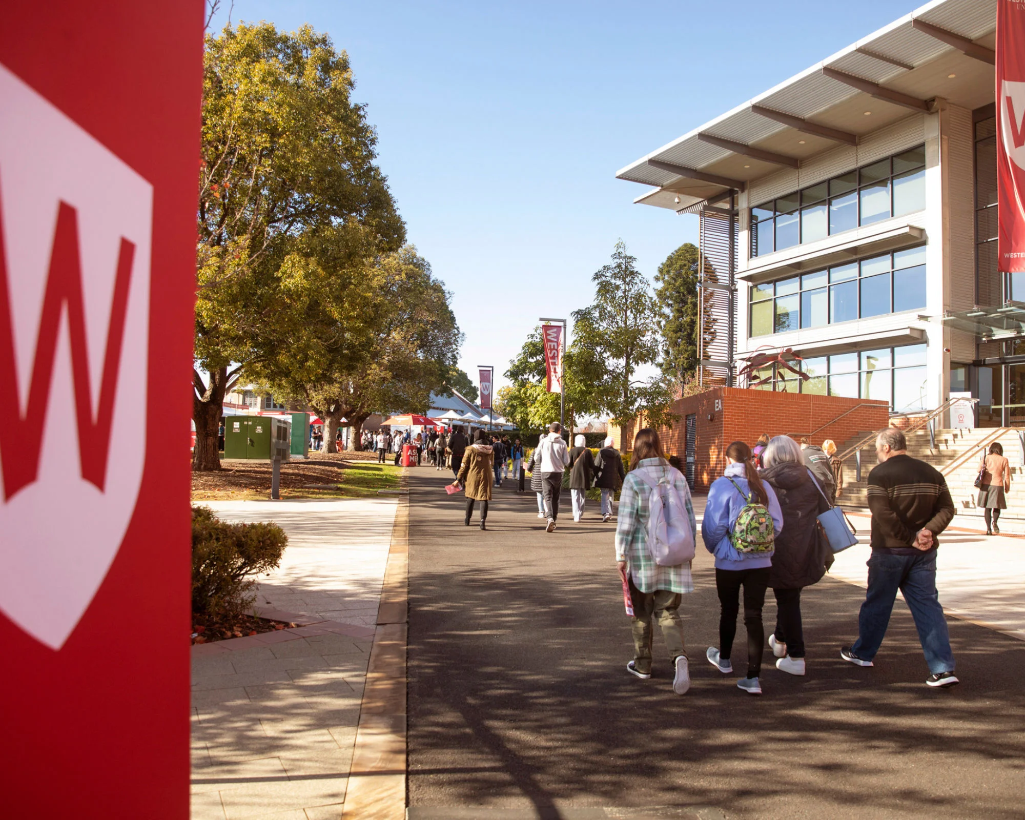 Woman in blue top outdoors